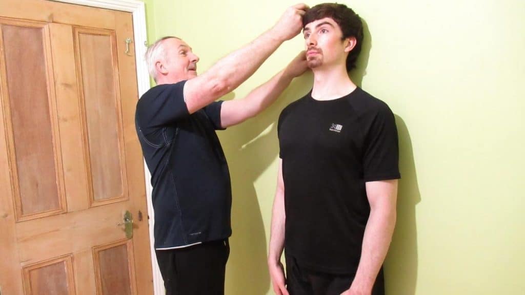 A man showing how to grow taller after 20 years old