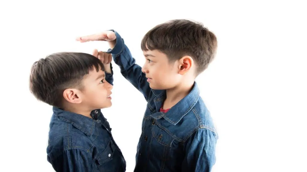 A boy demonstrating how to grow taller at 12 years old