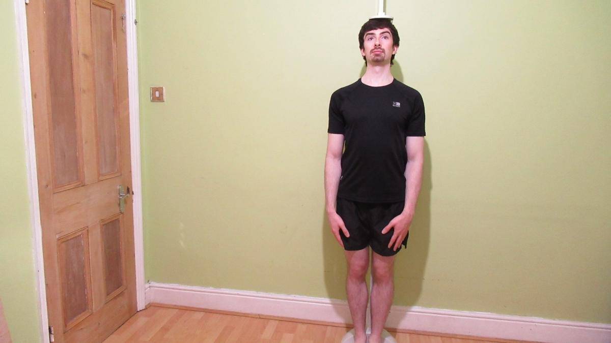 A man showing how to increase height after 21 years of age