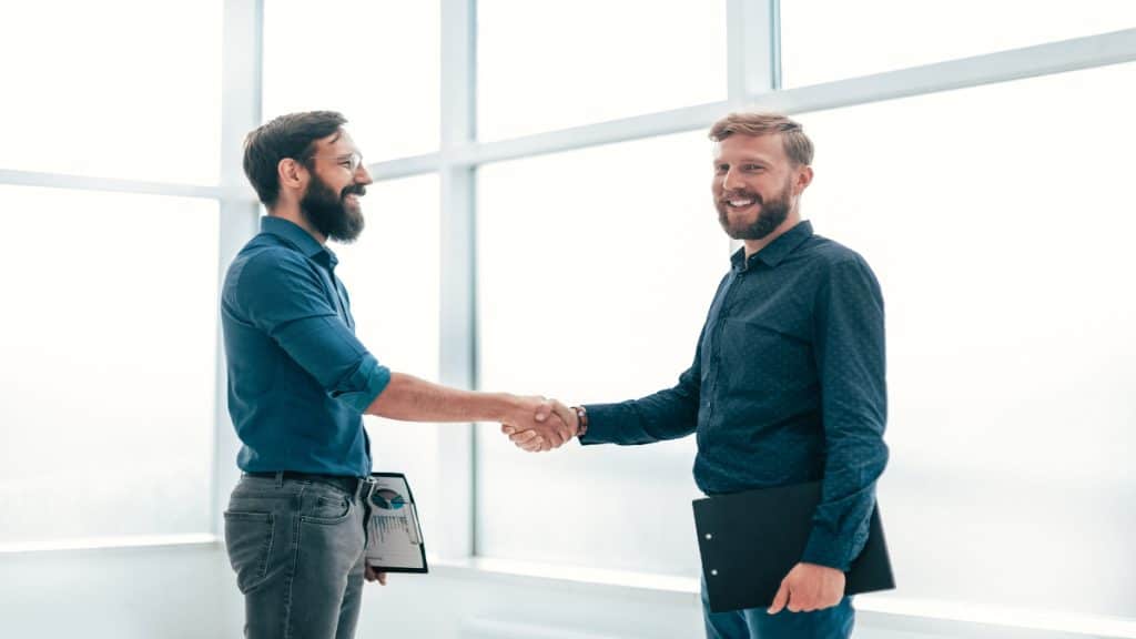 Two men shaking hands