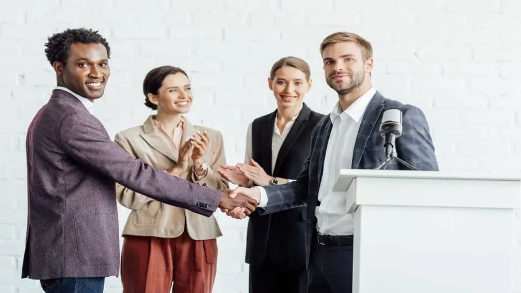 Some business people shaking hands