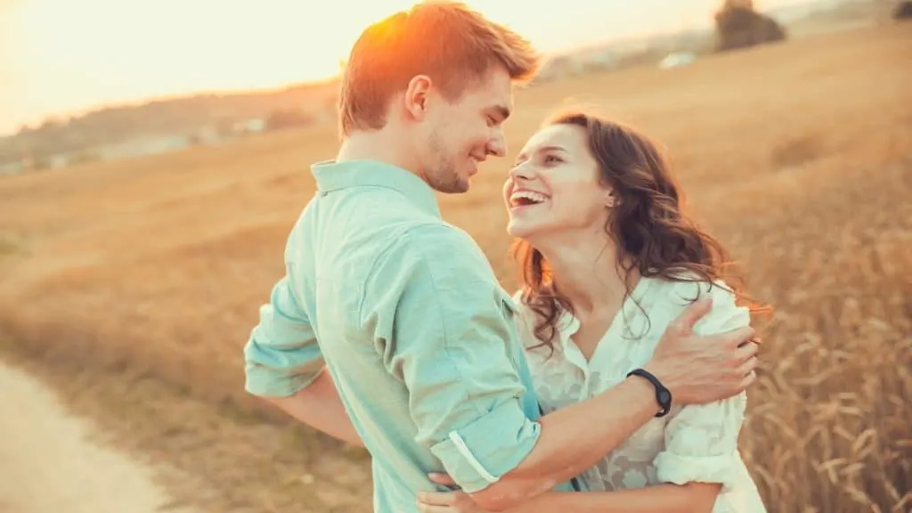 A young happy couple looking into each other's eyes