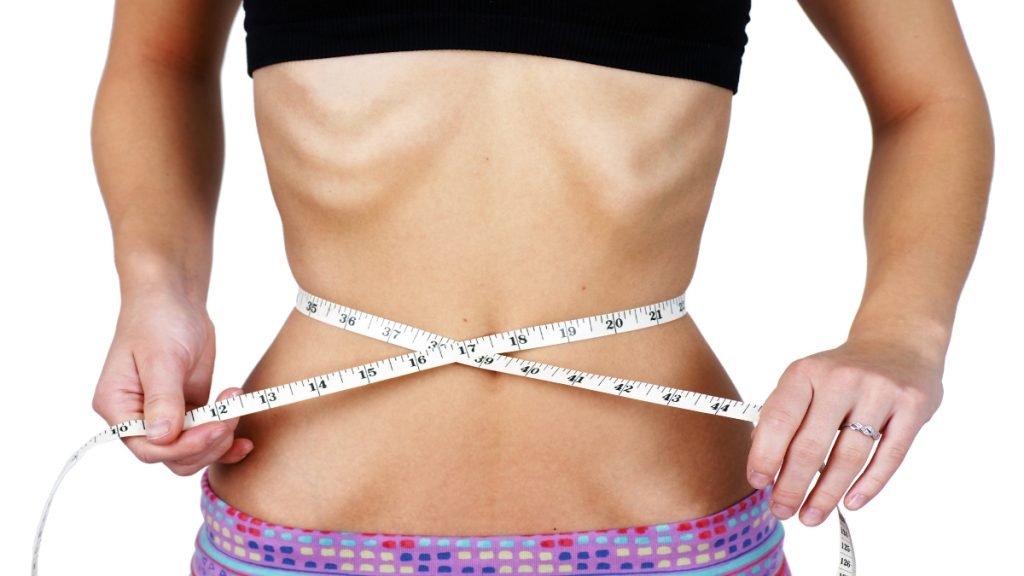 A thin woman who has a 12 BMI