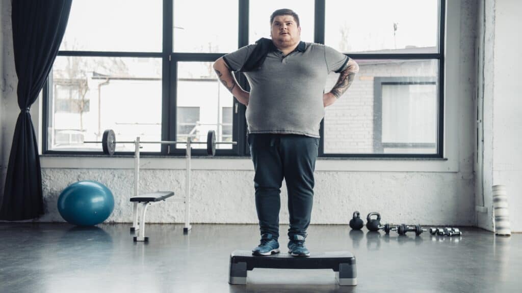 A 40 BMI male doing a workout