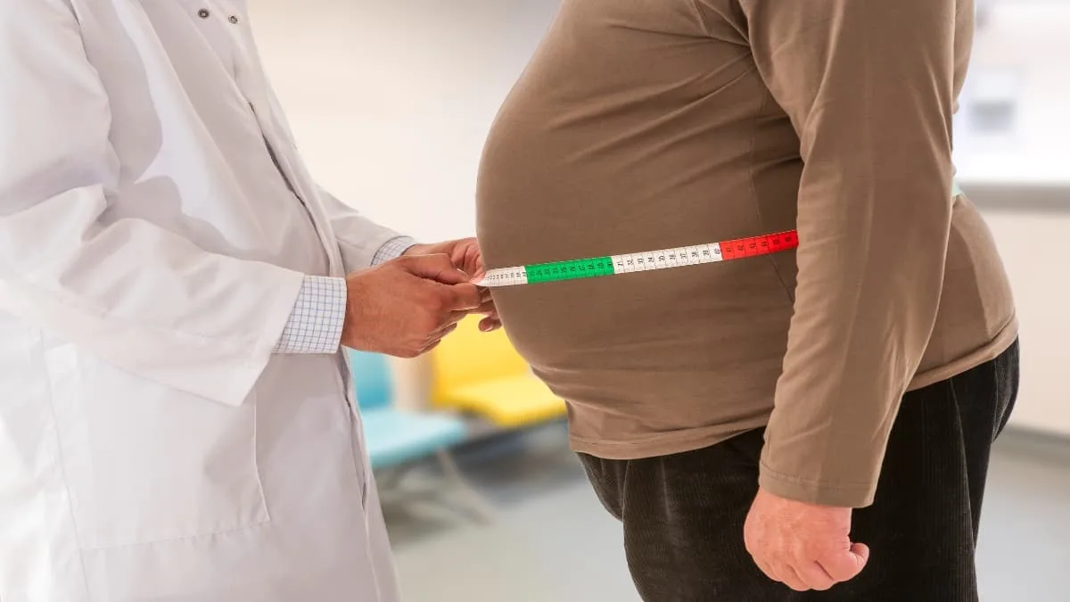 A BMI 53 man getting a checkup