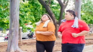 Two obese people with a BMI of 50