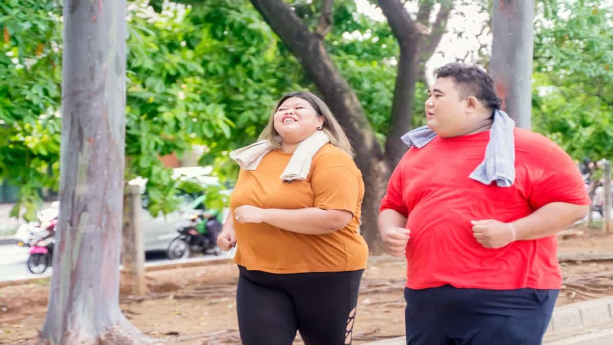 Two obese people with a BMI of 50
