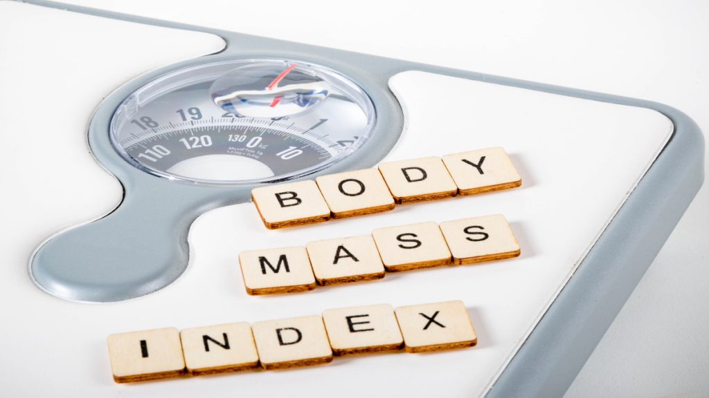 body mass index written on a weighing scale
