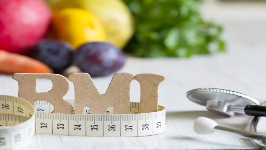 the word BMI next to a measuring tape