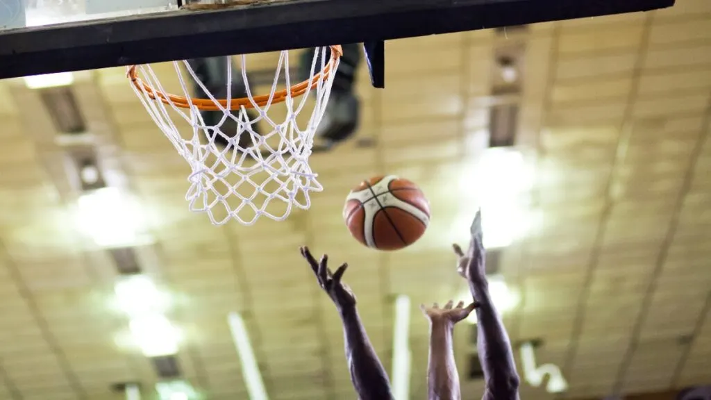 Some 7 foot 1 NBA players reaching for the basketball