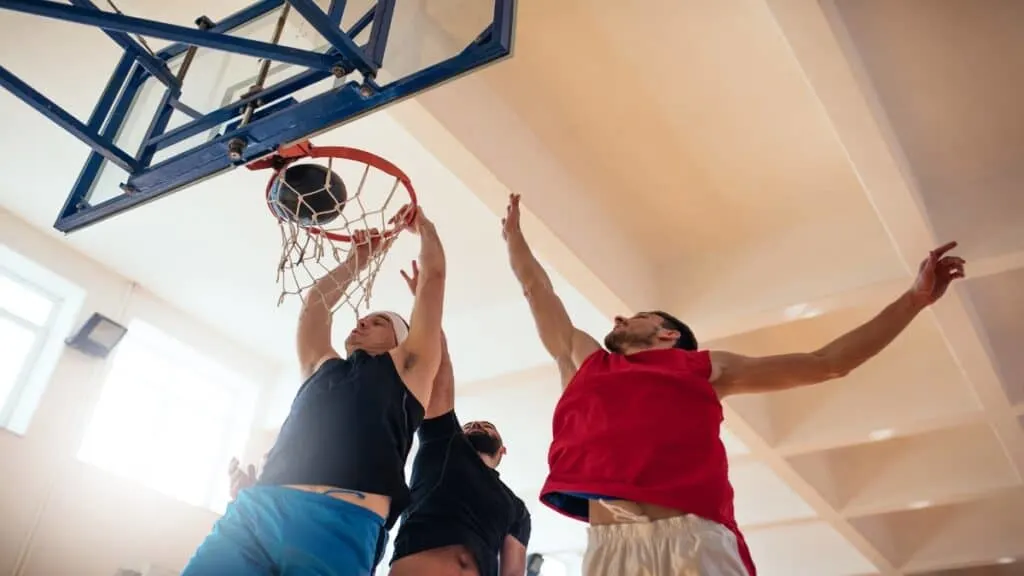 Some 7 foot 2 NBA players jumping for the basketball