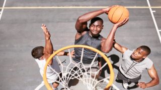 One of the best 6’10 NBA players dunking the basketball in the hoop