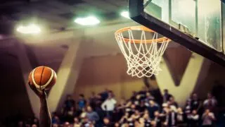 One of the best 7’2 NBA players throwing a basketball towards the hoop