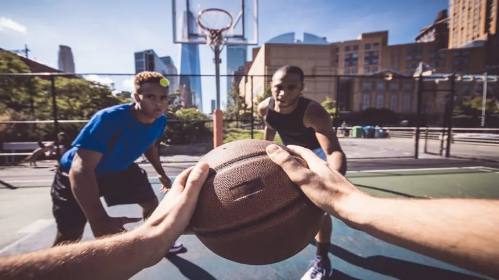 Two NBA players that are 5'10 playing a game of basketball