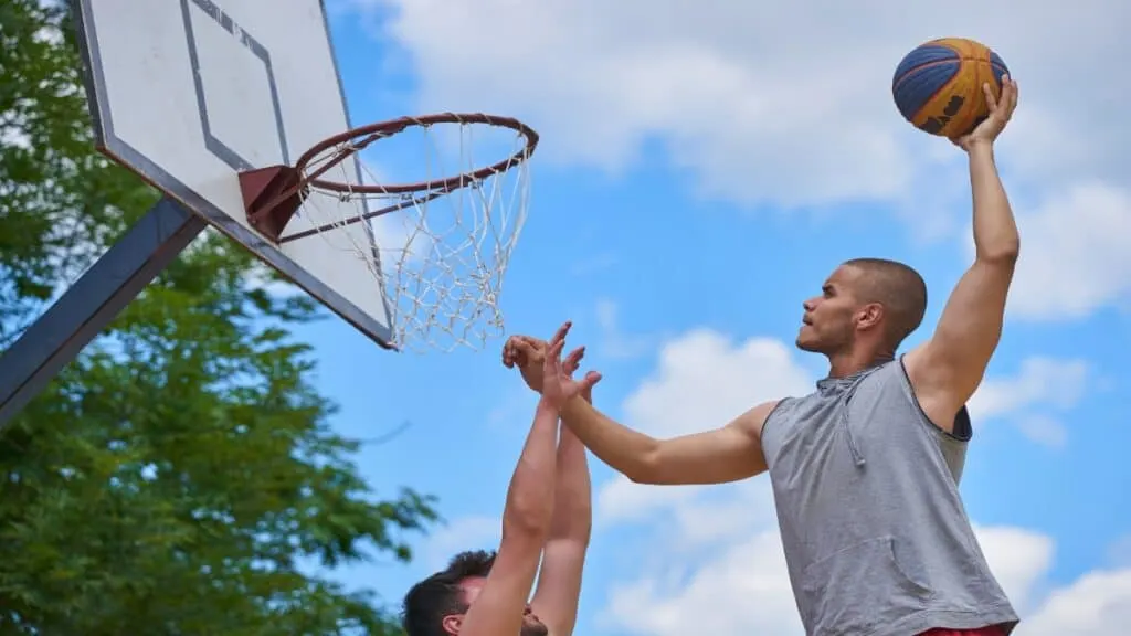 Some NBA players that are 6’5 playing a game of basketball